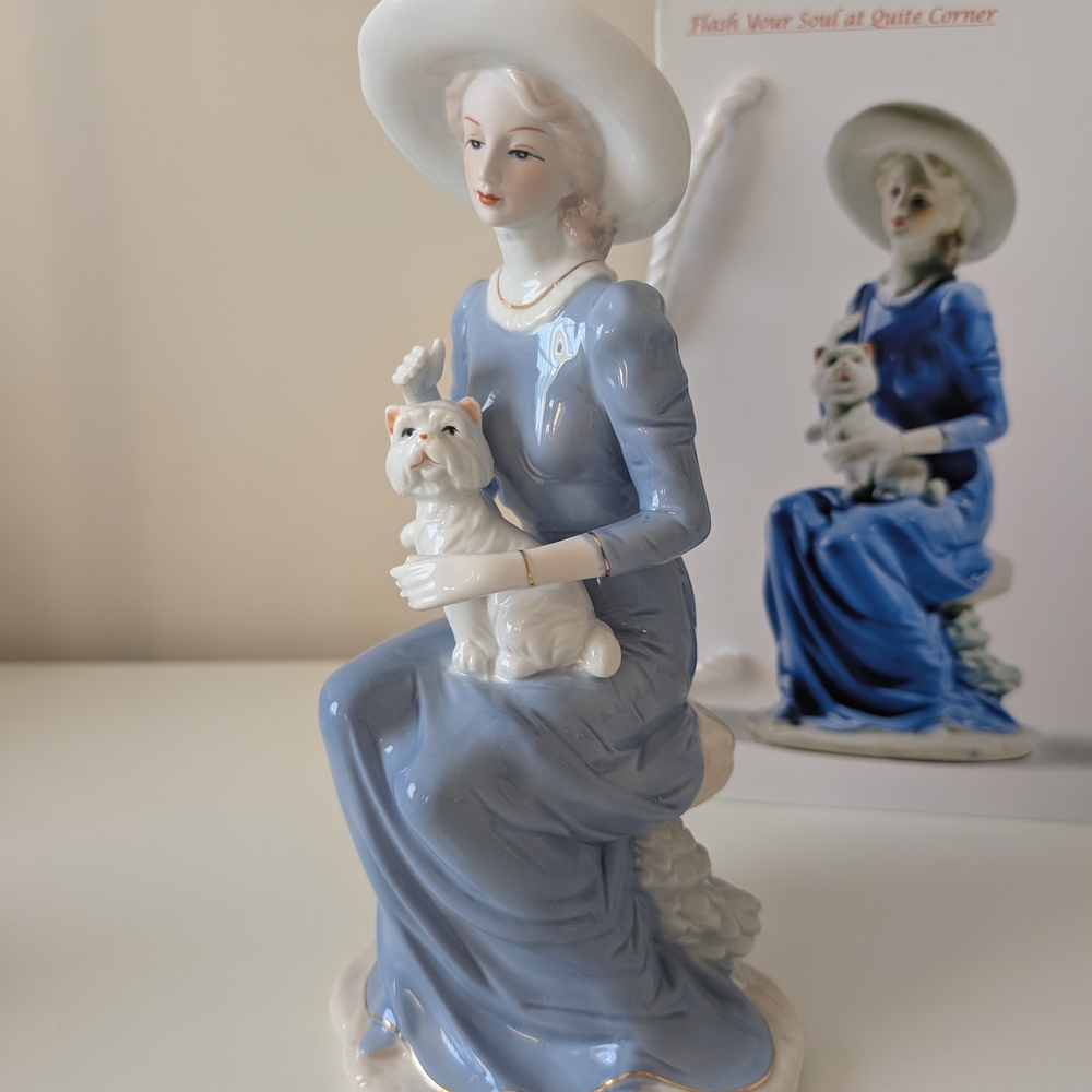 Elegant Lady Figurine in Blue with White Hat